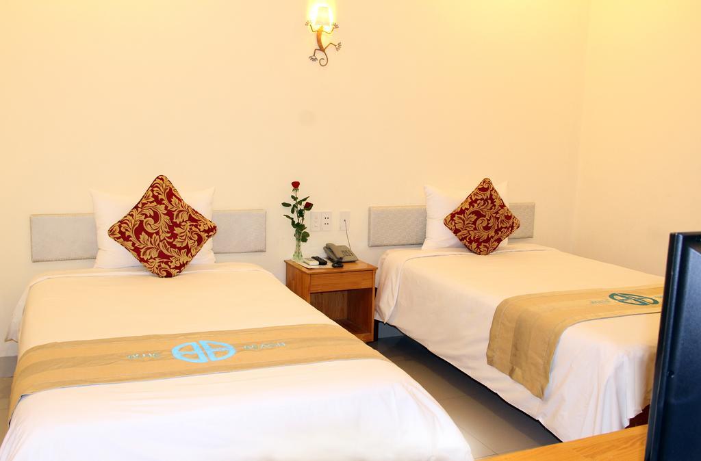 Blue Beach Hotel Da Nang Quarto foto